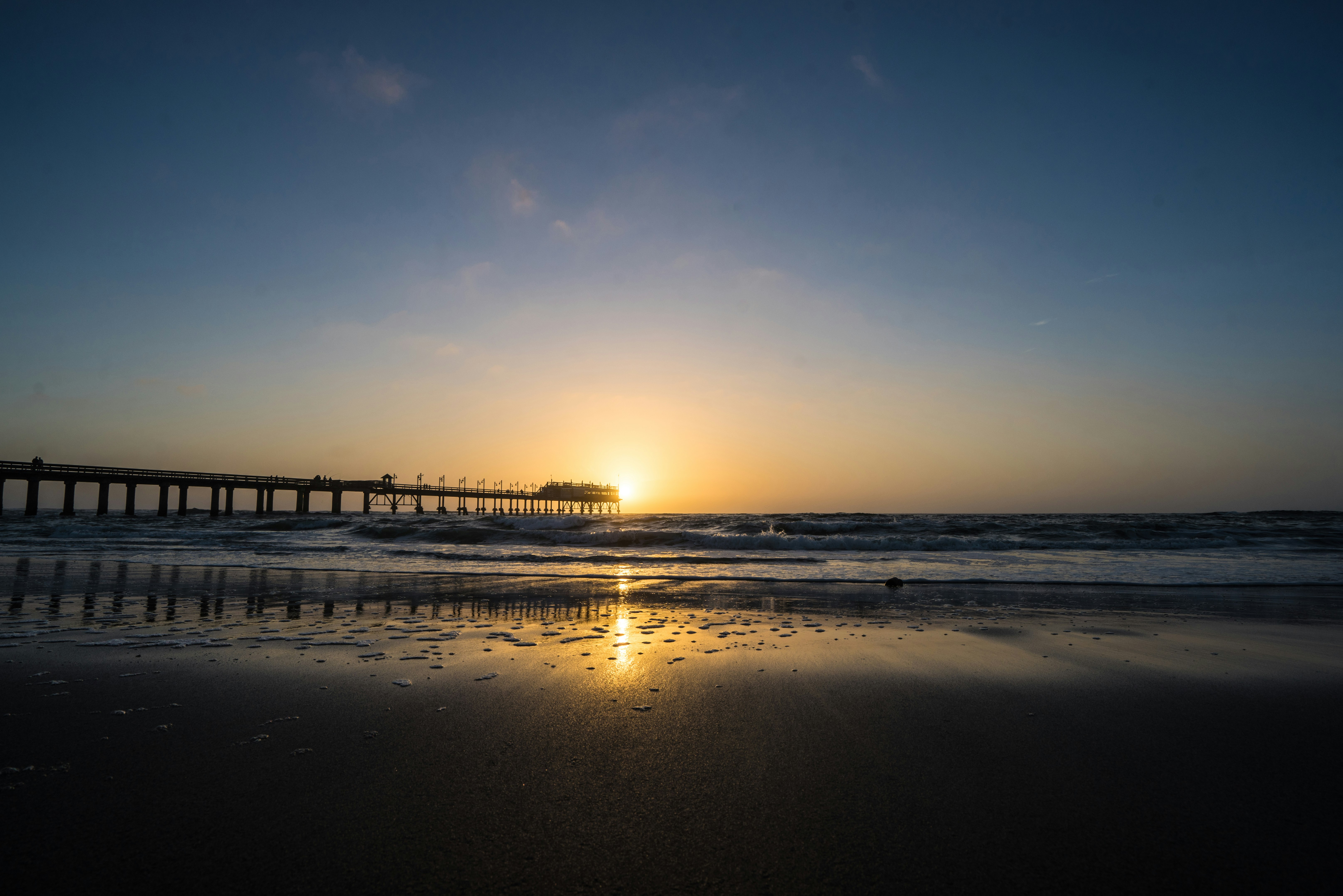 dock on shore at sunrise